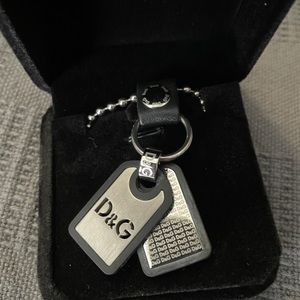 Unique Dolce & Gabbana double mini dog tag necklace with 21” leather rope chain.